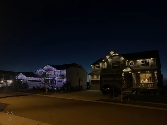 Gemstone permanent roofline lights in holiday colors on a Colorado home (photo 22 of 136)