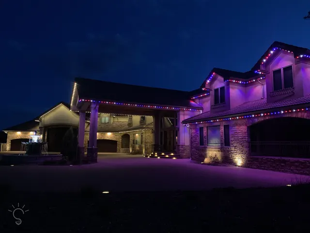 Gemstone permanent roofline lights in holiday colors on a Colorado home (photo 24 of 136)