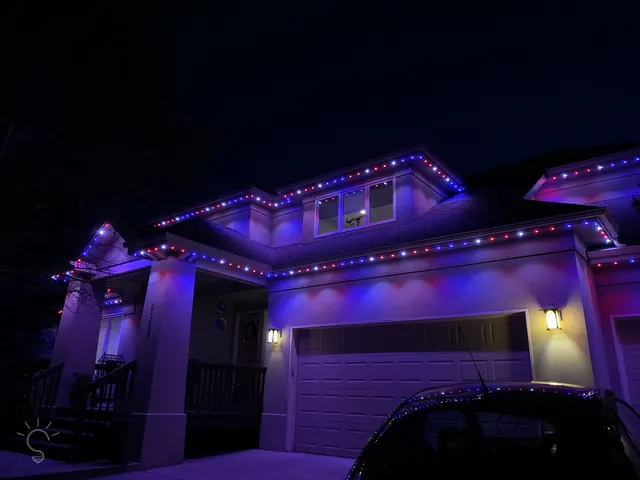 Gemstone permanent roofline lights in holiday colors on a Colorado home (photo 46 of 136)