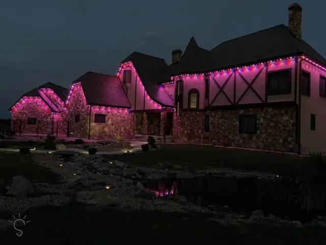 Gemstone permanent roofline lights in holiday colors on a Colorado home (photo 50 of 136)