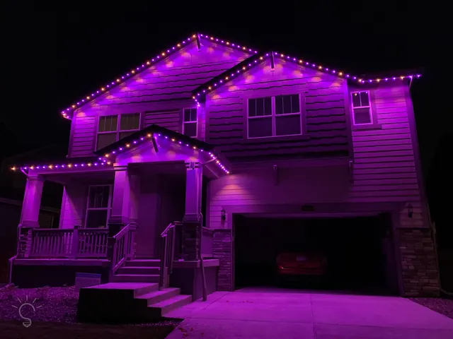 Gemstone permanent roofline lights in holiday colors on a Colorado home (photo 66 of 136)