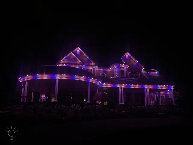 Gemstone permanent roofline lights in holiday colors on a Colorado home (photo 69 of 136)