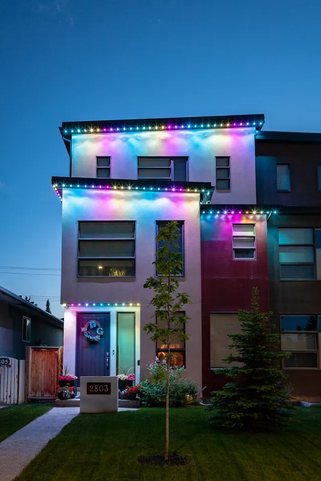 Gemstone permanent roofline lights in holiday colors on a Colorado home (photo 71 of 136)