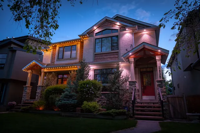 Gemstone permanent roofline lights in holiday colors on a Colorado home (photo 73 of 136)