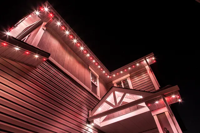 Gemstone permanent roofline lights in holiday colors on a Colorado home (photo 78 of 136)