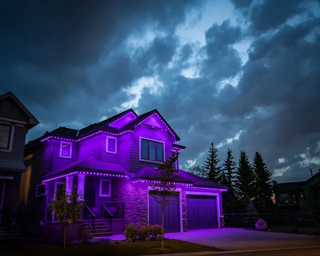Gemstone permanent roofline lights in holiday colors on a Colorado home (photo 83 of 136)