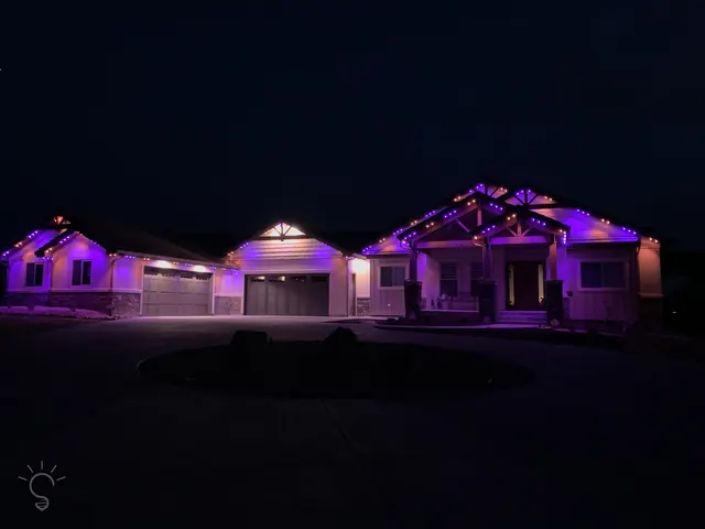 Gemstone permanent roofline lights in holiday colors on a Colorado home (photo 102 of 136)