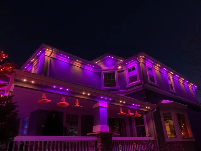 Gemstone permanent roofline lights in holiday colors on a Colorado home (photo 113 of 136)